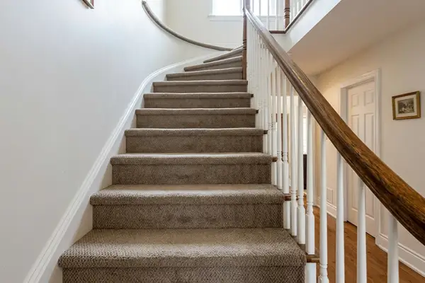 Staircase Wall to wall carpet price comparison showing carpet samples with different pile textures and flooring material options