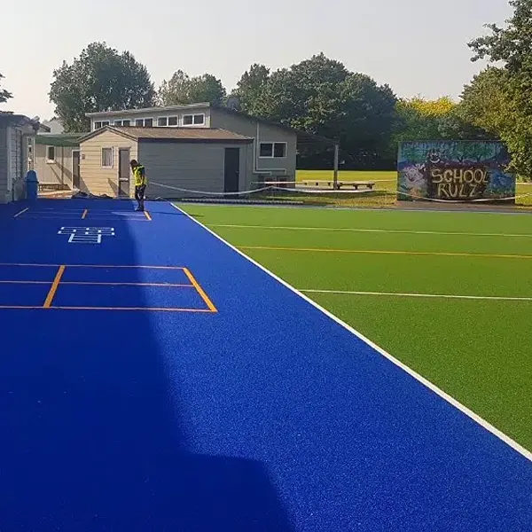 School Artificial Grass close-up highlighting soft fibers and durable playground surface