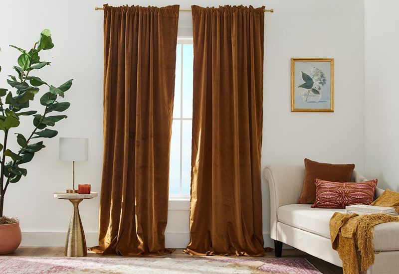 How do you hang curtains on a sun-facing window